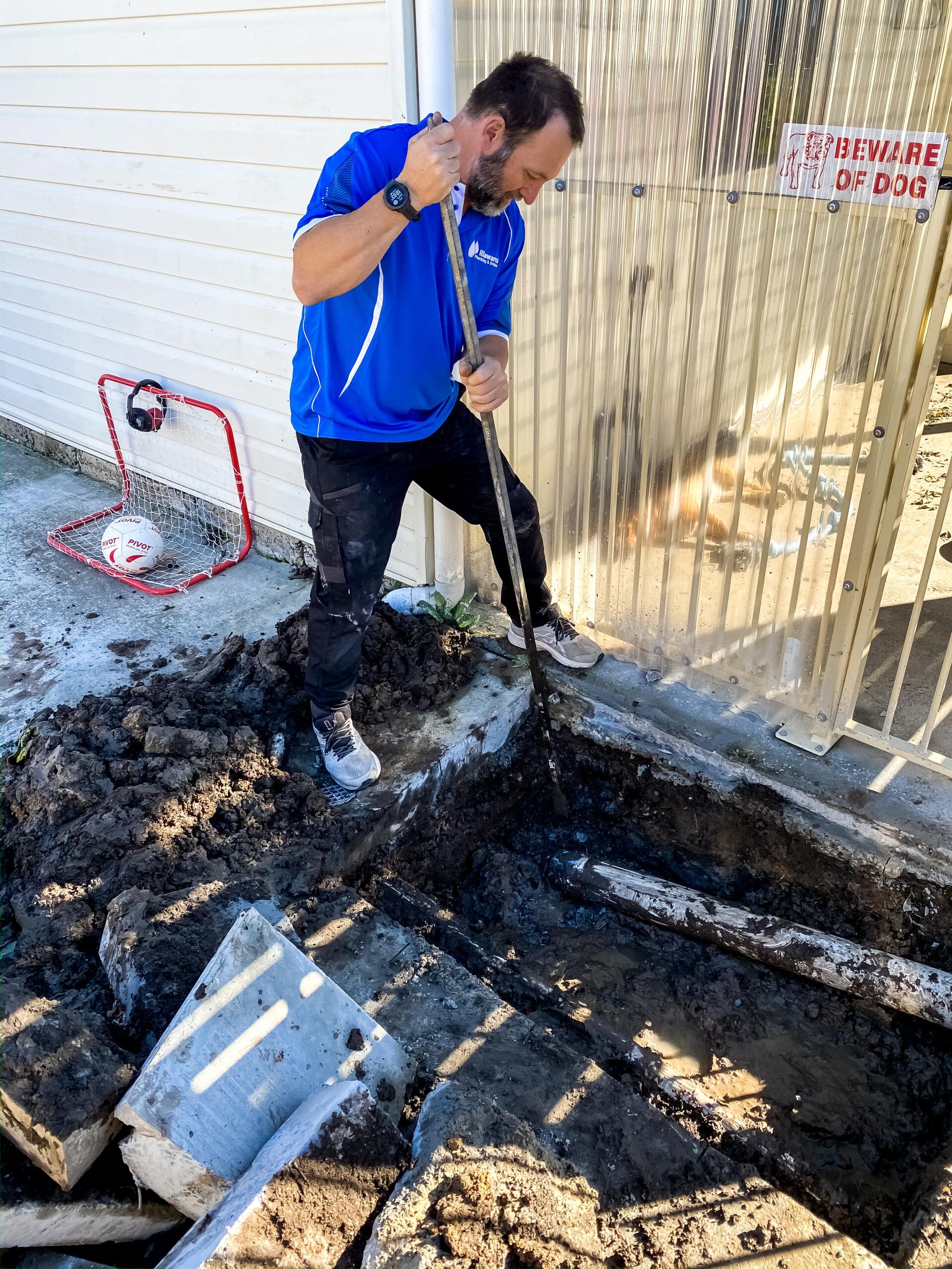 Local plumber Wollongong using professional tools to unclog a drain efficiently